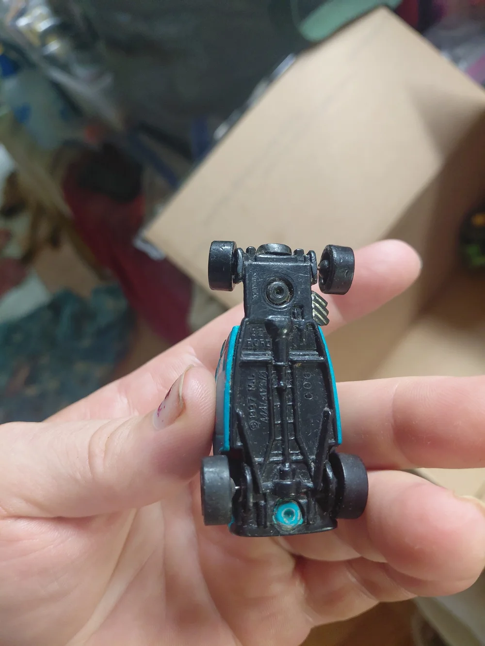 vintage 1997 Hot Wheels '32 Ford die-cast toy car in a light blue color.
